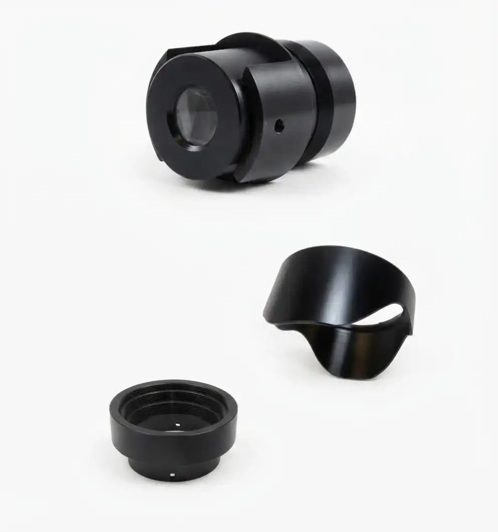 Anodised aluminium lens housings and retaining rings
